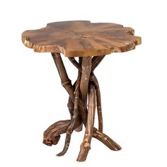 a wooden table that is made out of wood and has branches on the base, as well as an oval top