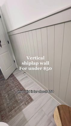 a bathroom with white shiplap walls and wood flooring is featured in this ad