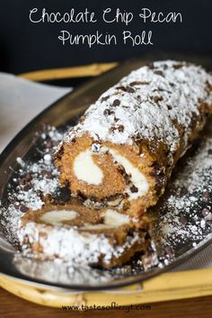 a plate with some food on it and powdered sugar in the middle, sitting on a table