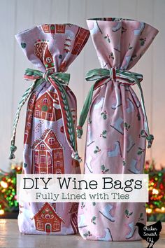 two wine bags that have been made to look like they are wrapped in pink and green fabric