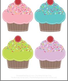 four different colored cupcakes with sprinkles on them