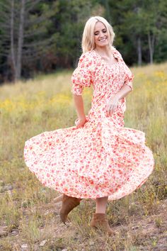 Embrace the floral frenzy with our Celeste Dress. This full-length frock features a feminine flower pattern that will effortlessly brighten your day. The smocked, figure-flattering bodice and ultra-sweet puff sleeves nicely balance the twirl-worthy skirt, creating the perfect summer ensemble for romantic date nights or family-filled picnics at the park. STYLE INFO & CARE The smocked bodice for a flexible, comfortable fit Tiered Skirt Fully lined 100% polyester Tie detail in the back Maternity fr Romantic Date, Romantic Dates, Tier Skirt, Tiered Skirt, Floral Maxi, Brighten Your Day, Floral Maxi Dress, Flower Pattern, Perfect Summer