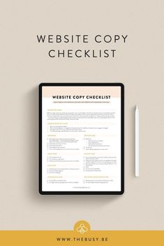 the website copy checklist is displayed on a tablet with a pen and paper next to it