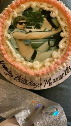 a birthday cake with a photo of a woman on it