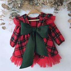 Flannel cloth dress with red and green tartan for babies, with red tulle ruffles and green bow with a matching diaper cover with tulle ruffles to match the dress, a perfect set for Christmas, typical Christmas photo shoot. We make it in any color you need, you can choose any modification you like just talk to me. It is the perfect gift for toddlers and newborns. Ideal garments for fun moms or to make a very special gift. You will find many assorted items in the store, you decide to compose your Toddler Plaid Christmas Dress, Christmas Plaid Dress Baby, Tartan Baby Dress, Baby Girl Christmas Dress, Baby Christmas Dress, Tulle Ruffles, Christmas Dress Baby, Green Tartan