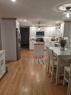 the kitchen is clean and ready to be used as a dining room or living room