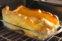 an omelet in a glass baking dish on the oven rack