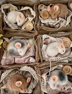 four stuffed mice in baskets with buttons on them