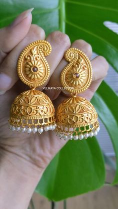 Beautiful matt gold jhumkas with traditional design. Plating color is yellow gold.   Length: 6 cm   Width: 3 cm - Ships out in 1-2 business days from Canada - Free shipping within Canada over CAD 75 - Tracking provided upon shipping - Guaranteed good quality.   Please note color may vary a little due to digital image limitations. Buy matching bangles and bracelets: https://www.etsy.com/ca/shop/VelikayaCollection?section_id=32318583 CUSTOMS and IMPORT TAXES: Buyers are responsible for any customs Brass Jhumkas With Intricate Design, Ornate Brass Jhumkas For Festive Occasions, Gold Dual-tone Temple Jewelry Jhumkas, Ornate Gold Jhumkas, Ornate Brass Jhumkas For Wedding, Jhumka Designs, Gold Jewellry, Handmade Clay Jewelry, Gold Ring Designs