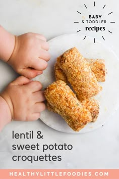 two hands reaching for pastries on a plate