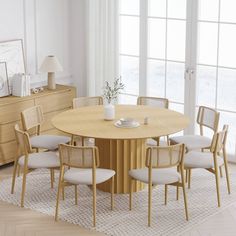 a dining table with six chairs around it