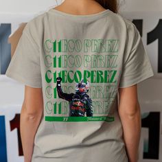 Fuel your Style with this Checo 11 T-Shirt Whether you're a racer, an enthusiast, or someone who craves the thrill of speed, our gear is made to empower your journey. *Made with medium fabric (180 g/m²) *100% Cotton for year-round comfort *Adult unisex Sizing Do not dryclean; Machine wash: warm (max 40C or 105F); Do not bleach; Tumble dry: low heat; Iron, steam or dry: low heat. All items are custom print to order, all sales are final. We do not accept returns or exchanges. If there is an issue with your order please contact us. Production  2-4 Days Shipping  3-7 Days Formula 1 Racing, Sergio Perez, Text Design, Design T Shirt, Red Bull, Formula 1, Motorsport, Favorite Outfit, Unisex T Shirt