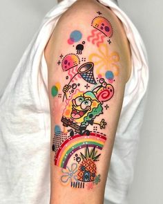 a person with a colorful tattoo on their arm