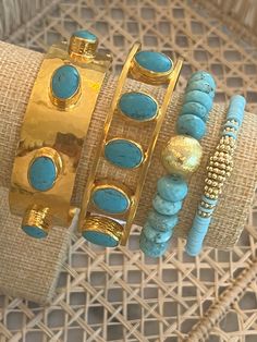 Composition: Sky Blue Polymer Heishi beads dyed with golden brass beads. Maintenance: moderate resistance to fresh water. In order to keep your jewelry longer, avoid contact with water and perfume. Size: Elastic. Affordable Turquoise Stackable Stretch Bracelet, Gold Bohemian Beaded Bracelets With Gemstones, Gold Beaded Bracelets With Natural Stones For Festivals, Blue Bohemian Bracelets With Polished Beads, Gold Beaded Jewelry For The Beach, Blue Polished Beaded Bracelets For Festivals, Blue Brass Bracelet, Blue Beaded Bracelets For Festival With Polished Beads, Blue Gemstone Beads Festival Bracelet