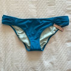 Victoria’s Secret The Knockout Bikini Swim Bottom, Size M, In Beautiful Peacock Blue / Teal With Aqua Lining. Nwt / Tags And Protective Liner Still Attached. Small Gold Vs Logo Plate On Back. Smoke-Free Home. (Matching Top In 36c Is Also Available In My Closet But It Has Been Worn Once.) Victoria's Secret Blue Bottoms For Summer, Victoria's Secret Blue Summer Bottoms, Blue Bottoms For Spring Beach Party, Blue Victoria's Secret Swimwear For Spring, Victoria's Secret Blue Swimwear For Spring, Victoria's Secret Blue Stretch Swimwear, Victoria's Secret Blue Beach Bottoms, Fitted Blue Bottoms For Beach Party, Victoria's Secret Stretch Bottoms For Beach Party