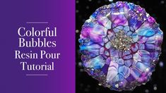 a purple and blue flower with the words colorful bubbles resin pour