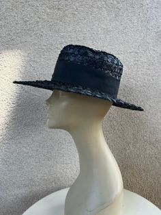 Vintage 60s Eva Mae Modes brim black cello straw grosgrain ribbon sz 21.5" Made in USA. Good condition Measurements  Interior band 21.5 Brim 3.5" Crown height 6" Width hat 14" Classic Black Boater Hat For Party, Vintage Black Straw Hat With Curved Brim, Vintage Black Straw Hat With Short Brim, Vintage Black Brimmed Straw Hat, Vintage Black Adjustable Boater Hat, Vintage Adjustable Black Boater Hat, Fitted Black Straw Hat, Black Straw Hat For Summer Party, Black Formal Boater Hat With Flat Brim