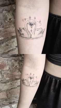 two swans with hearts on their necks are shown next to each other in this tattoo