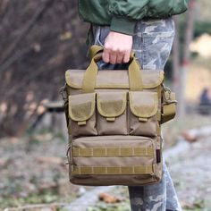 a person carrying a large bag with multiple compartments on the front and back, in camouflage