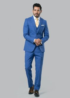 Blue Chambray Suit | Menguin | Blue Chambray Wedding Suit Light Blue Notch Lapel Suits For Office, Light Blue Notch Lapel Suit For Office, Blue Slim Fit Suits With Welt Pockets, Modern Blue Suits For Business Casual, Modern Blue Suit For Business Casual, Blue Notch Lapel Suit In Suiting Fabric, Blue Three-piece Suit With Notch Lapel For Business Casual, Modern Blue Suits With Notch Lapel, Modern Blue Suit With Notch Lapel