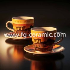 two coffee cups sitting next to each other on top of a wooden table in front of a black background