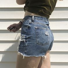 "These distressed gap cutoff shorts are the perfect high-waisted mom shorts you've been looking for!  Styling Tip: Pair with a tucked in basic tank and tie a flannel around your waist for the perfect 90's grunge look  Short Measurements: Waist 31\"  Hips 42\" Models Measurements:  Waist: 32\" Hips: 42\" Height: 5'8\"" Black Mom Jeans, 90's Grunge, Look Short, Grunge Look, Pink Lingerie, Cutoff Shorts, Mom Shorts, Beautiful Skirts, Cut Off Shorts