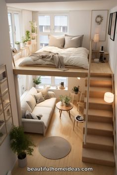 a loft bed is built into the side of a small room with stairs leading up to it