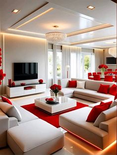 a living room filled with lots of white furniture and red pillows on top of it