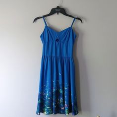 Brand New Without Tags, No Damage. Beautiful Tropical Fish Printed Along The Skirt And A Fun, Small Cutout In The Top. Lined On The Inside With Adjustable Straps. Size 5. Zipper Along The Side Is In Perfect Condition. Blue Fitted Sundress With Spaghetti Straps, Fitted Blue Summer Sundress, Blue Aquarium, Beautiful Tropical Fish, Fish Print, Tropical Fish, Adjustable Straps, Fish, Womens Dresses