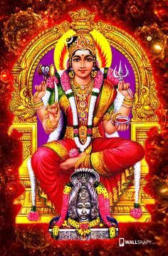 the hindu god sitting on top of a throne with his hands up in front of him