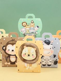 several small boxes with animals on them sitting next to each other