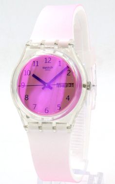 Descriptiopan: Brand Name: Swatch Model number: GE719 Case: Gloss clear   Dial color: Solar spectrum glass cover the pink dial with blue arabic numbers and hands  Features: Analog day/date display at 3 o'clock  Band: Pink silicone with matte semi-transparent loop  Clasp: Clear plastic buckle  Movement: Swiss Quartz Water Resistant: 30 meter / 3 ATM / 99 feet  Case dimension: 34 mm (3.4 cm) Watch measurement: 9 1/4 inches (23.5 cm) Band Width: 18 millimeters (1.8 cm) MSRP: $80.00 Original Swatch gift box and manual instruction booklet are included. Visit our store to see more Swatch watches and other famous name brand watches.                                                                                                          Payment  We accept all major credit cards. Shipping:   Domest Modern Pink Analog Watch, Trendy Pink Analog Watch, Spectrum Glass, Arabic Numbers, Dating Women, Swatch Watch, Glass Cover, 3 O Clock, Semi Transparent