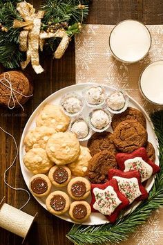 a plate full of cookies and other holiday treats