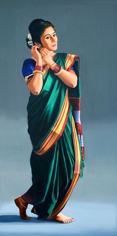 a painting of a woman in green sari holding a blue tray and talking on the phone