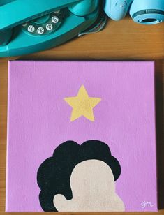 a pink canvas with a woman's face on it and a star above her head