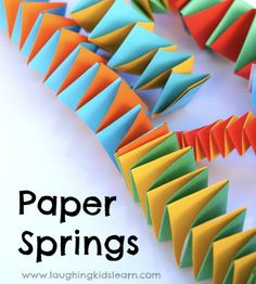 colorful paper spring decorations with text overlay