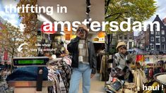 a man standing in front of a clothing store