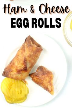 ham and cheese egg rolls on a white plate