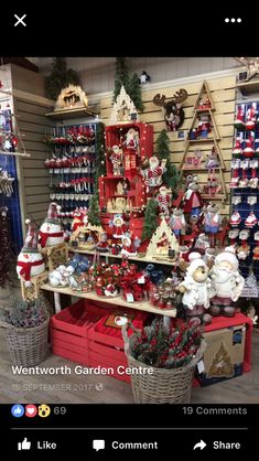 the christmas tree is decorated with red and white presents