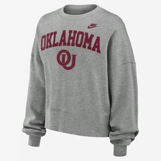 The Legacy Classic Arch Crew is made with dropped shoulder seams that help create an oversized look and brushed French terry lining for a warm, comfortable outer layer. Its cross-dyed pattern accentuates the Oklahoma Sooners details. Gray Fall Sweater For College, Nike Gray Tops With Ribbed Cuffs, Collegiate Athletic Heather Sweatshirt For Fall, Nike Collegiate Tops For Fall, Gray Collegiate Long Sleeve Sweatshirt, Nike Gray Tops For Fall, Nike Gray Long Sleeve Sweatshirt, Gray Oversized Sweater For College, Oversized Gray Sweater For College