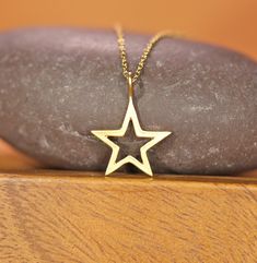 Gold star necklace, celestial necklace, silver star outline pendant, twinkle twinkle little star, layering necklace, little sister gift idea A perfectly cute gold vermeil star hanging from a 16 inch 14k gold vermeil chain. Please feel free to select a different length chain if you prefer. This star necklace is also available in sterling silver :) Star Measurement: 15mm Need an energy boost or a little healing? Or just a pop of color? https://www.etsy.com/listing/165088081/add-a-gemstone-power-bo Gold Jewelry With Star Print For Gift, Gold Star Necklace, Star Outline, Little Sister Gifts, Star Necklace Silver, Star Necklace Gold, Necklace Star, Celestial Necklace, Energy Boost