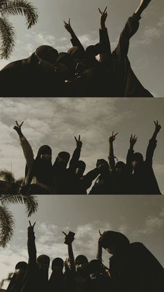 people are reaching up into the sky with their hands in the air and palm trees behind them