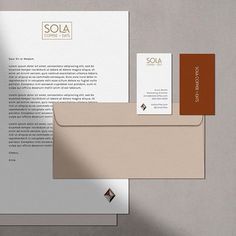 an envelope and business cards on top of each other