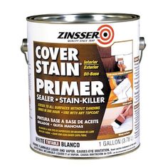 a can of white paint with the words cover stain primer on it's side