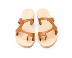 "When you think comfort and ease, you'll certainly think about these sandals. Once you've worn them that first time, you'll find it hard to part from them again. Available in an array of colors, there is a color to match any outfit, mood or personality! - Pictured in hazel brown color. - Leather straps available in 20 colors. - Premium quality natural tan leather insole. - Anti-slippery EVA out sole. - 0.27\" heel. Please contact me in case you have narrow or wide feet. SIZES Please watch the vi Custom Sandal, Sandals Wedding, Sandals Gladiator, Suede Slides, Women Slides, Handmade Sandals, Shoes Photo, Wedding Sandals, Leather Slide Sandals