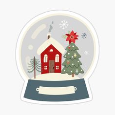 a snow globe with a red house and christmas trees in the snow inside sticker