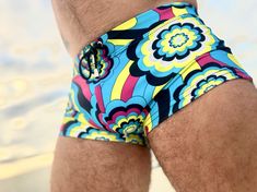 A zippy geometric in bright blue, purple, puce and white, this print puts forward your best curves. 225 pieces made. Purple Swim Trunks For Beachwear, Purple Beachwear Swim Trunks, Ocean Swim, Sandal Fashion, Bright Blue, Blue Purple, Flower Power, Swim Trunk, Trunk