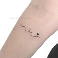 a woman's arm with a tattoo that says love and hearts on the side