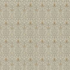 an old wallpaper pattern in beige and brown