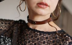 Introducing our captivating "Minimalist Leather Choker" - a stylish and versatile accessory that exudes timeless charm. Handcrafted with meticulous attention to detail, this choker is designed to elevate your style and add a touch of sophistication to any outfit. Made from premium quality Italian leather, this choker boasts durability and comfort, ensuring it remains a cherished piece for years to come. This "Minimalist Leather Choker" features a sleek and minimalistic design, making it suitable for various occasions. Whether you're dressing up for a special event or adding a chic flair to your everyday ensemble, this choker effortlessly blends with your wardrobe, making it a must-have accessory. Adjustable to your desired length, this choker ensures a perfect fit, and the secure fastening Classic Adjustable Choker For Formal Occasions, Trendy Adjustable Choker For Formal Occasions, Adjustable Trendy Choker For Formal Occasions, Classic Formal Adjustable Choker, Chic Handmade Choker As Gift, Chic Handmade Choker For Gift, Chic Handmade Adjustable Choker, Trendy Brown Choker Jewelry, Minimalist Adjustable Choker